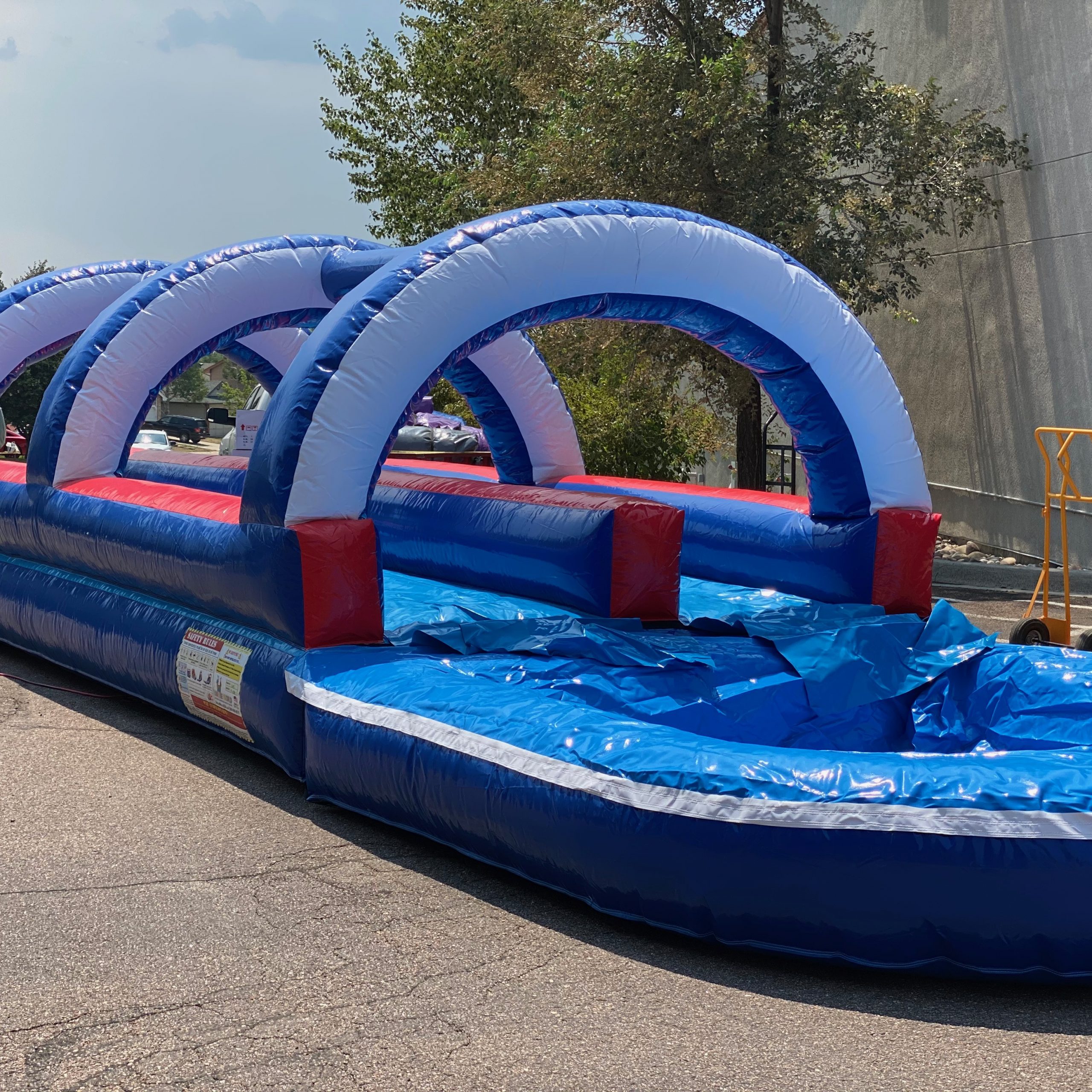 Patriots Slip N Slide with Pool - Bounce House Rentals & Water Slides